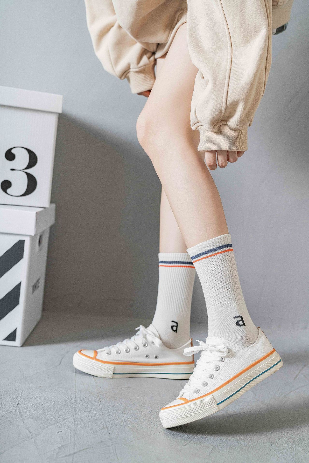 女袜秋冬高橡筋罗口字母ins嘻哈潮流学生滑板中筒袜运动长筒袜