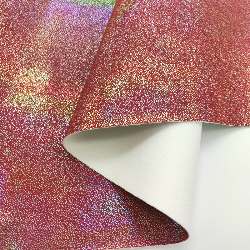 pu皮革面料镭射七彩小石子手袋箱包软包人造皮革皮料皮革面料厂家