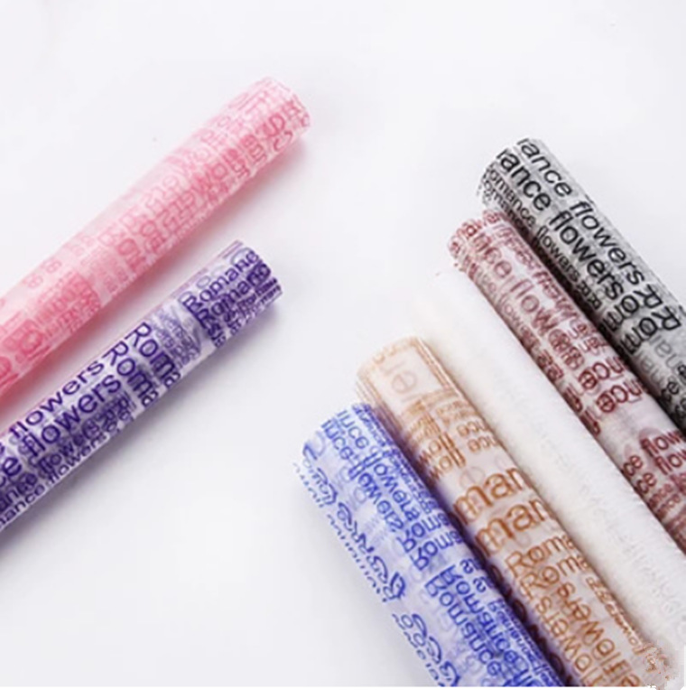 英文雾面纸半透明雾光纸平安夜塑料玻璃纸批发鲜花包装材料