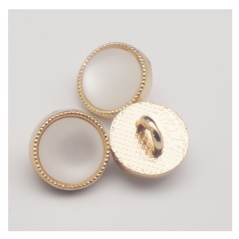 现货批发金属圆型猫眼扣 圆形带脚 女式衬衣大衣纽扣电镀合金扣子