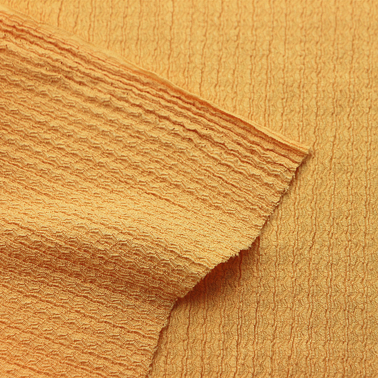 经编涤纶氨纶弹力针织提花凹凸泡泡纱绉布褶皱布时装女装童装面料