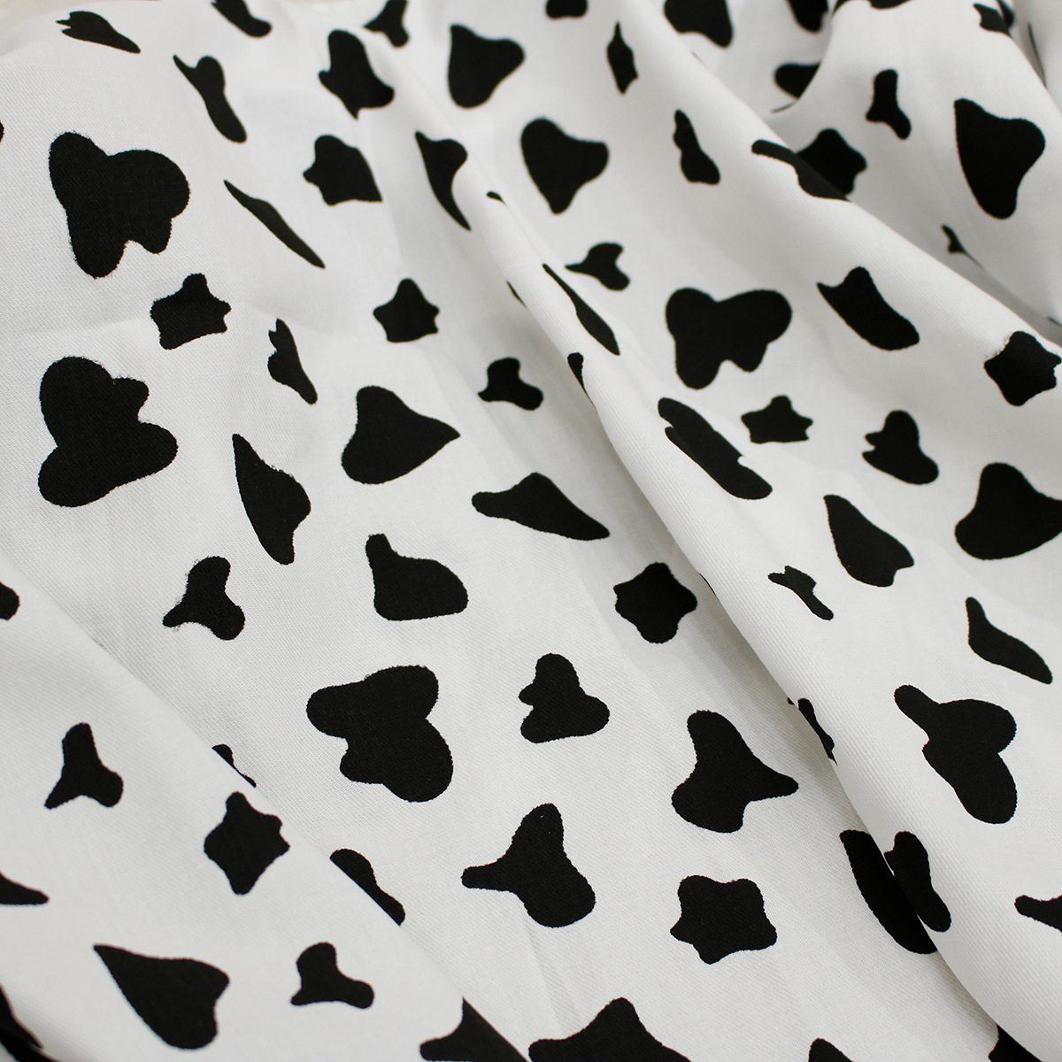 2021春夏新款迷彩奶牛斑纹印花全棉洗水棉面料 男女童装衬衫棉布