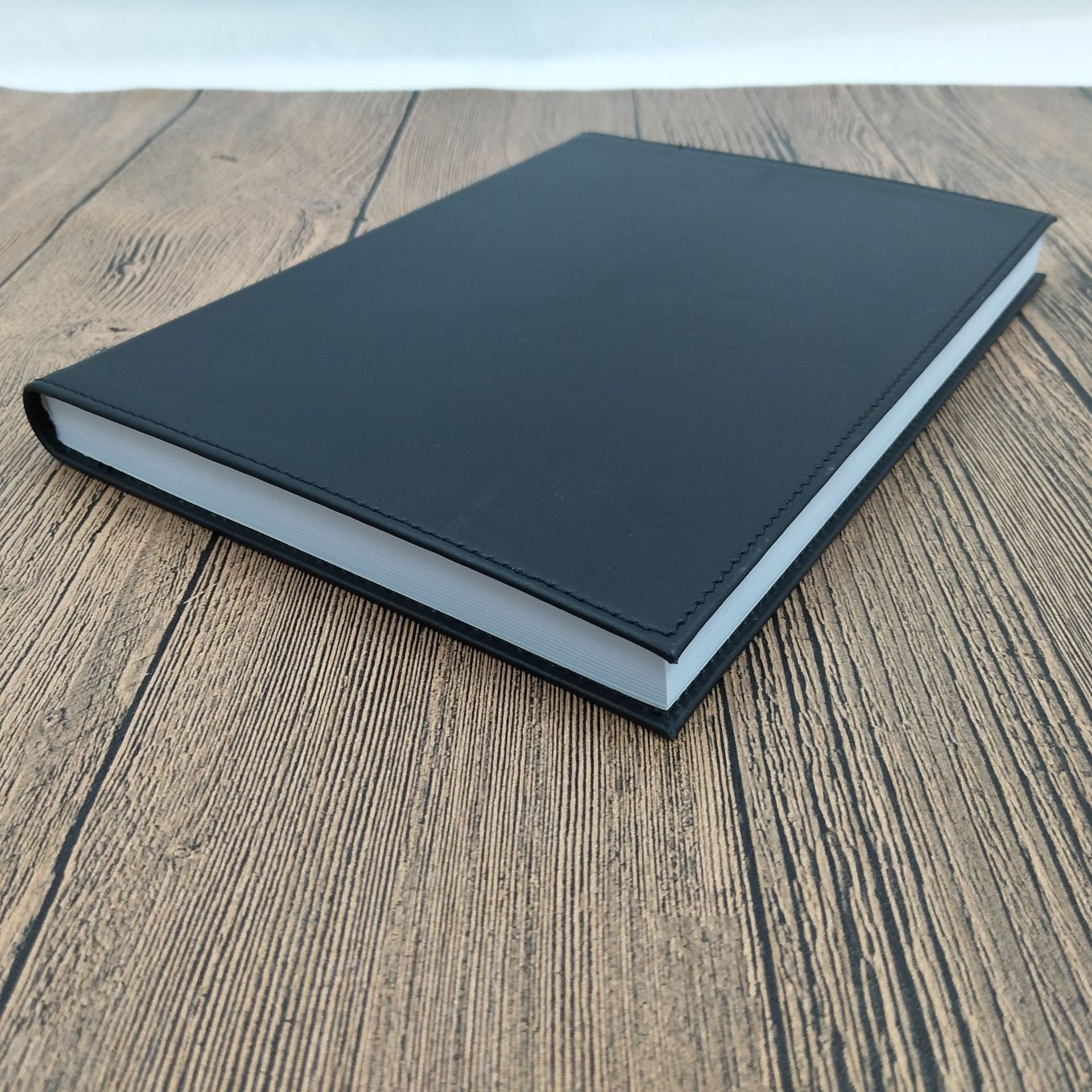 硬壳牛皮记事本32k道林纸80页横线 真皮a5胶装笔记本批量定制工厂