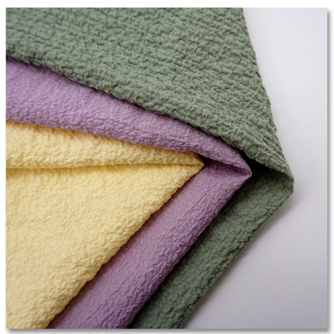 泡泡皱提花绉面料 连衣裙纱裙上装休闲装百褶布雪纺泡泡条布料