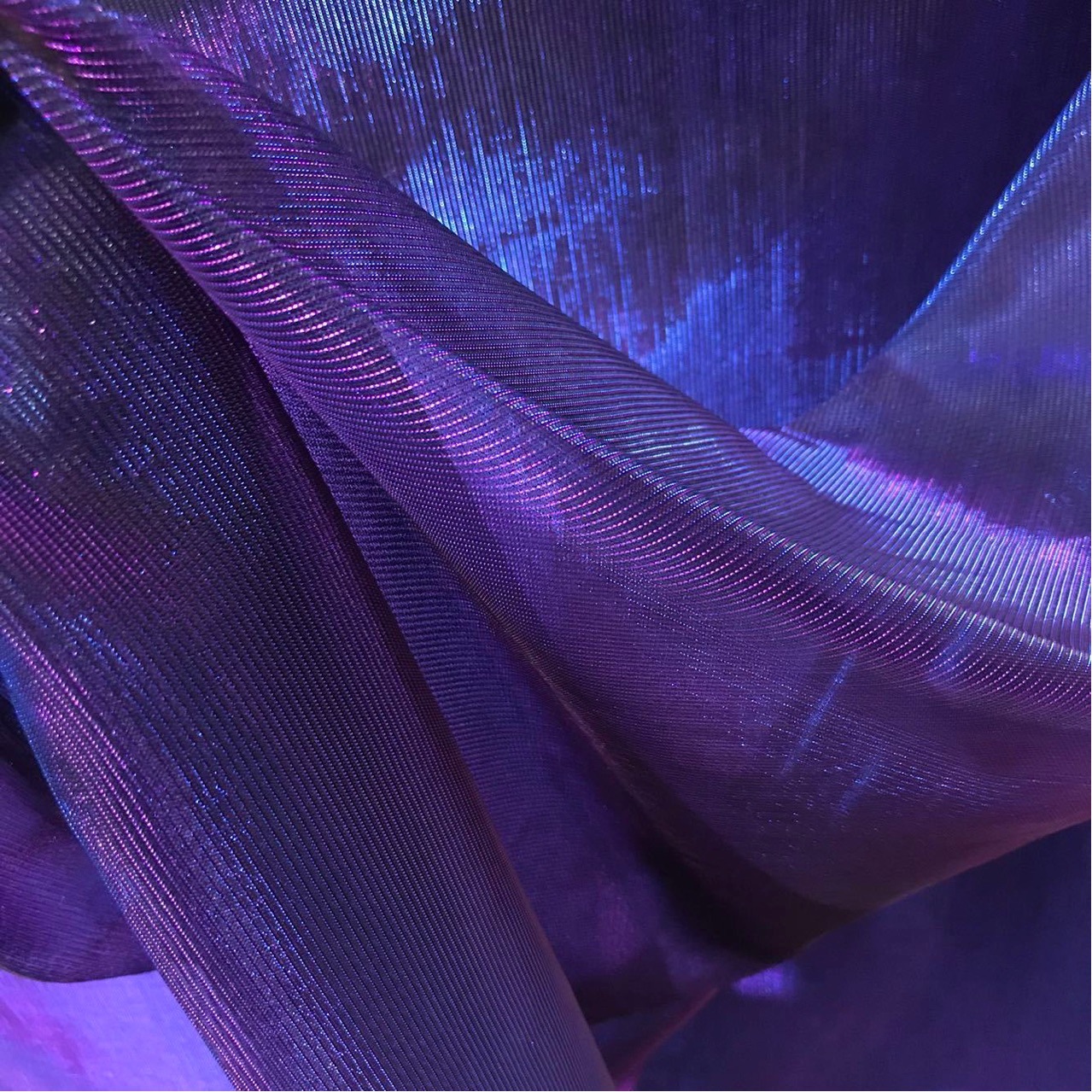 色泽未渍 镭射幻彩镂空面料网纱肌理网布礼服变色透视设计师布料
