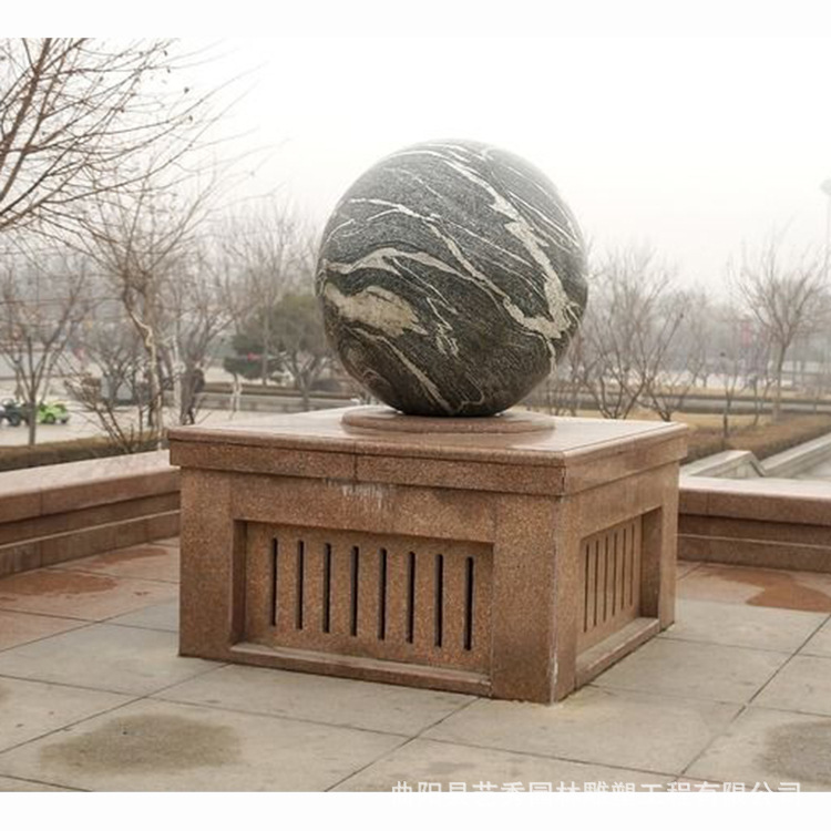 景观晚霞红石材风水球流水喷泉式转运球门前道路挡路石圆球墩