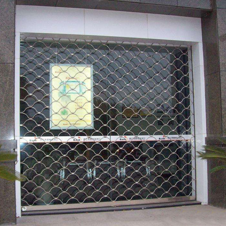 安装不锈钢通花网格卷帘门 电动渔网型卷帘门 商铺门店网状卷闸门