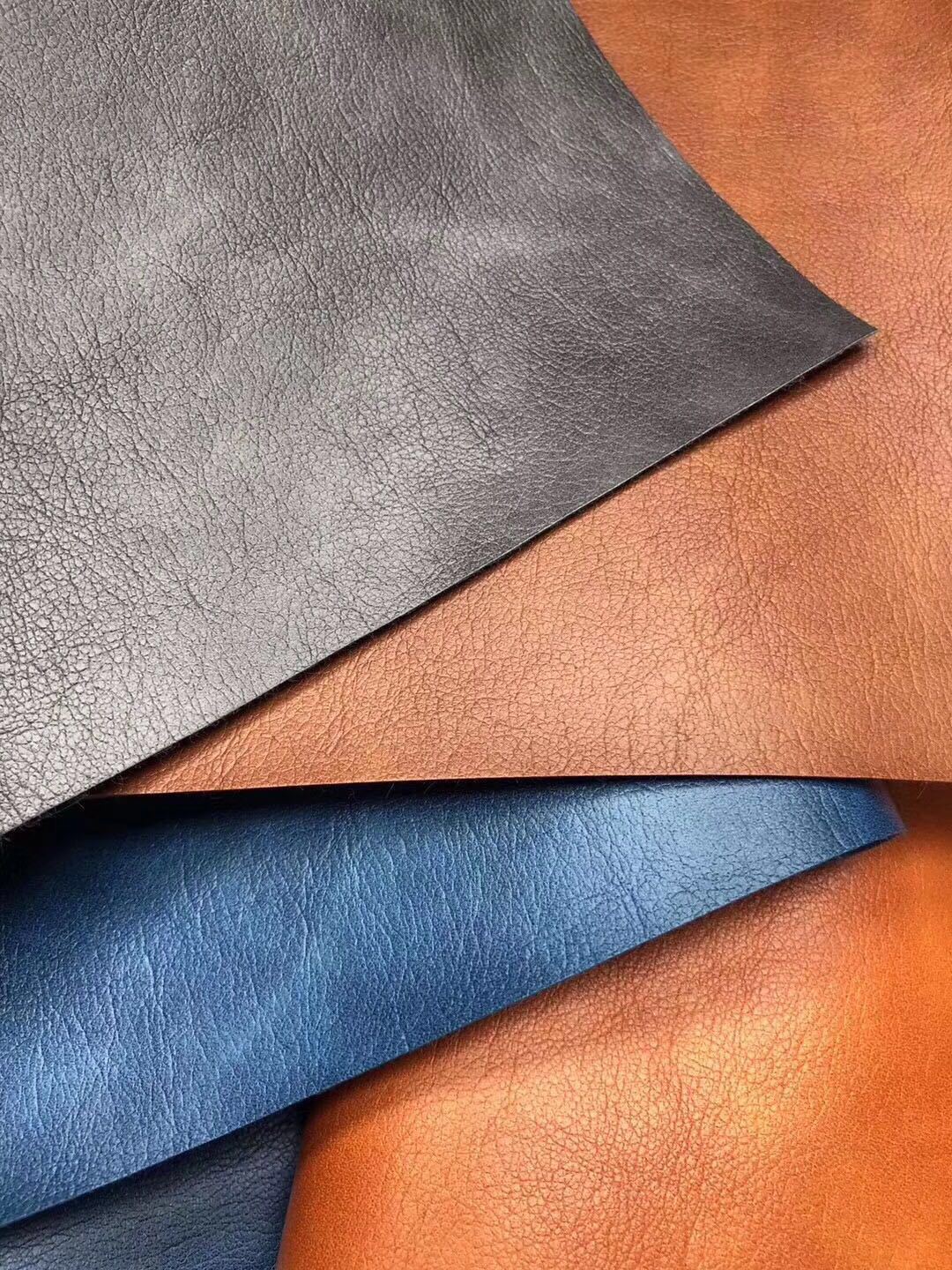 杰出皮革-a135持国天王系列热压变色人造革21款现货供应