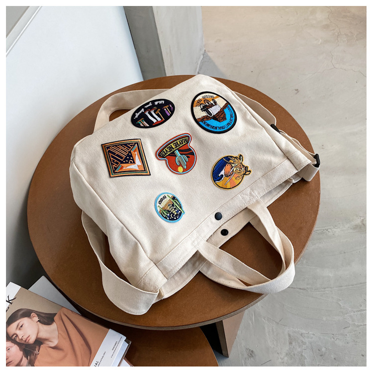 帆布包新款休闲刺绣徽章布标潮流时尚耐磨大容量单肩斜挎女包布包