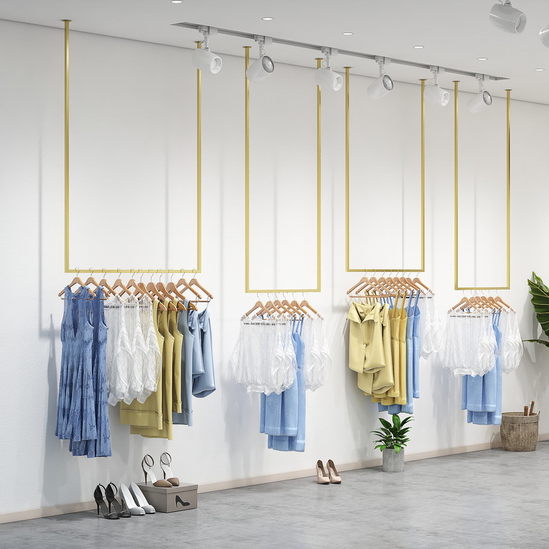 轻奢吊顶悬挂婚纱陈列架 现代女装店墙上展示架 金色衣服吊挂架