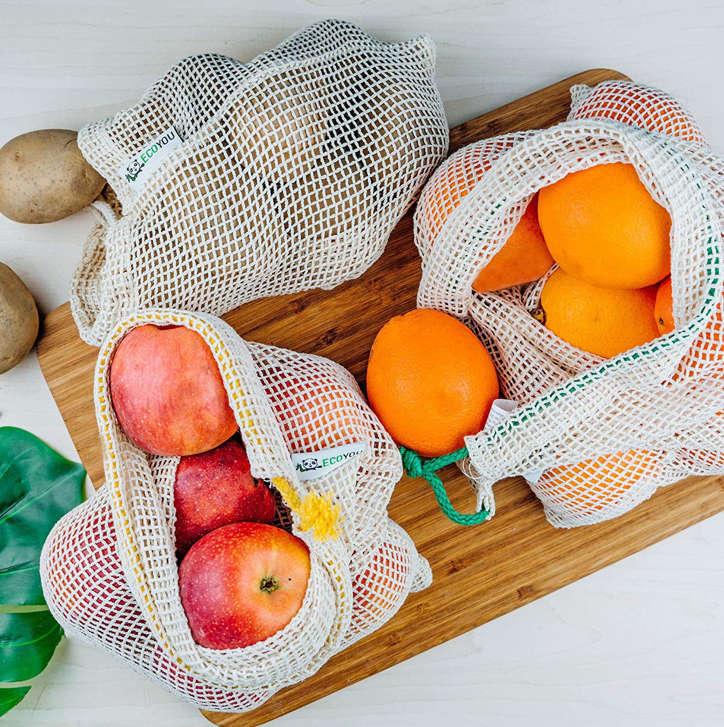 厂家定制全棉网袋正面加棉布标签超市购物水果蔬菜网袋网格束口袋