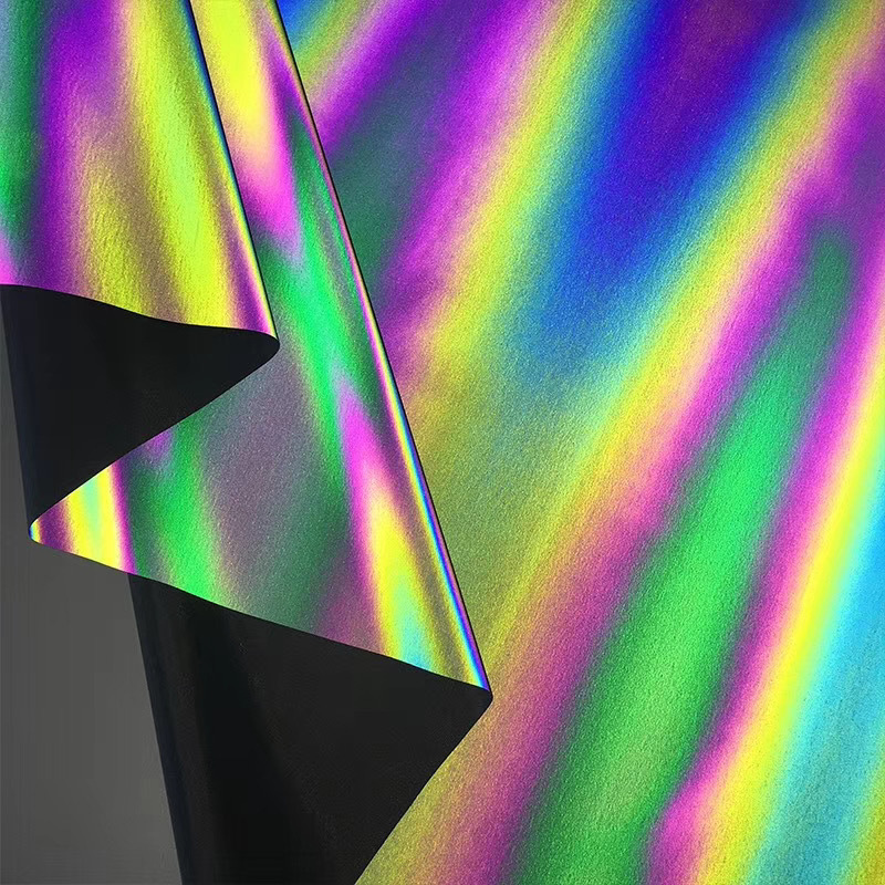 厂家供应pes反光刻字膜 高亮七彩服装用幻彩反光布反光热转印膜