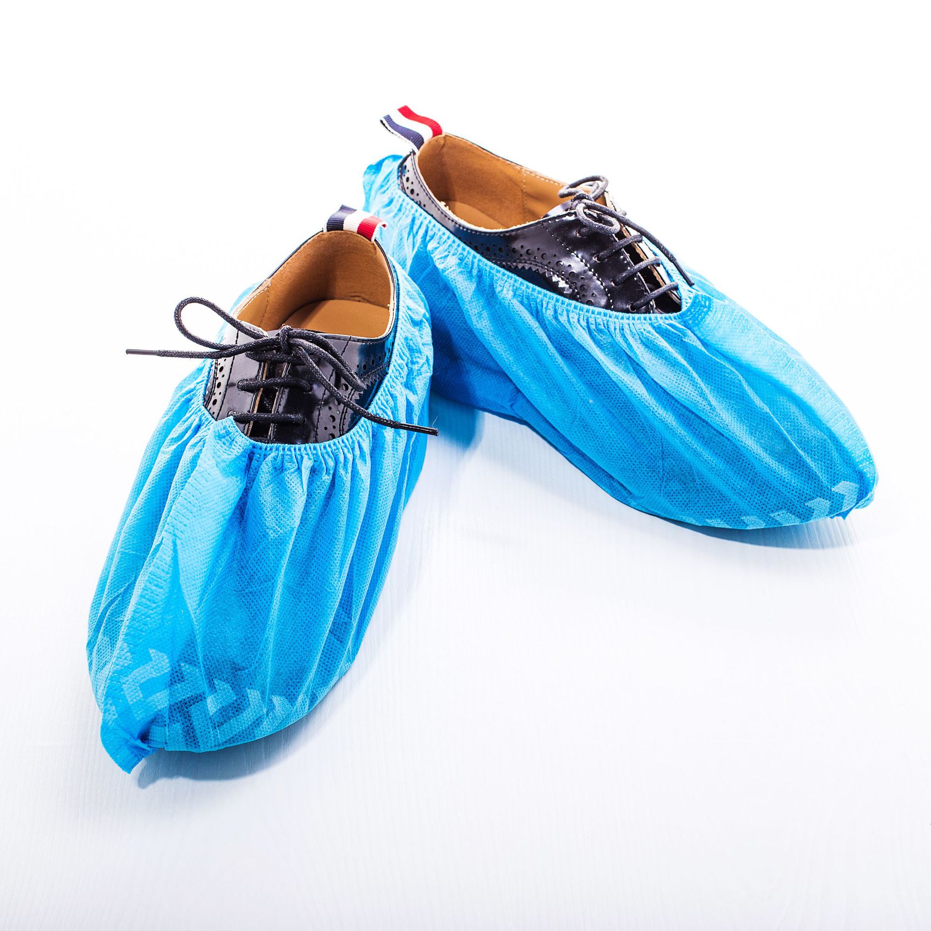 厂家直销一次性无纺布印花鞋套加厚防尘防滑全筋印花鞋套100只