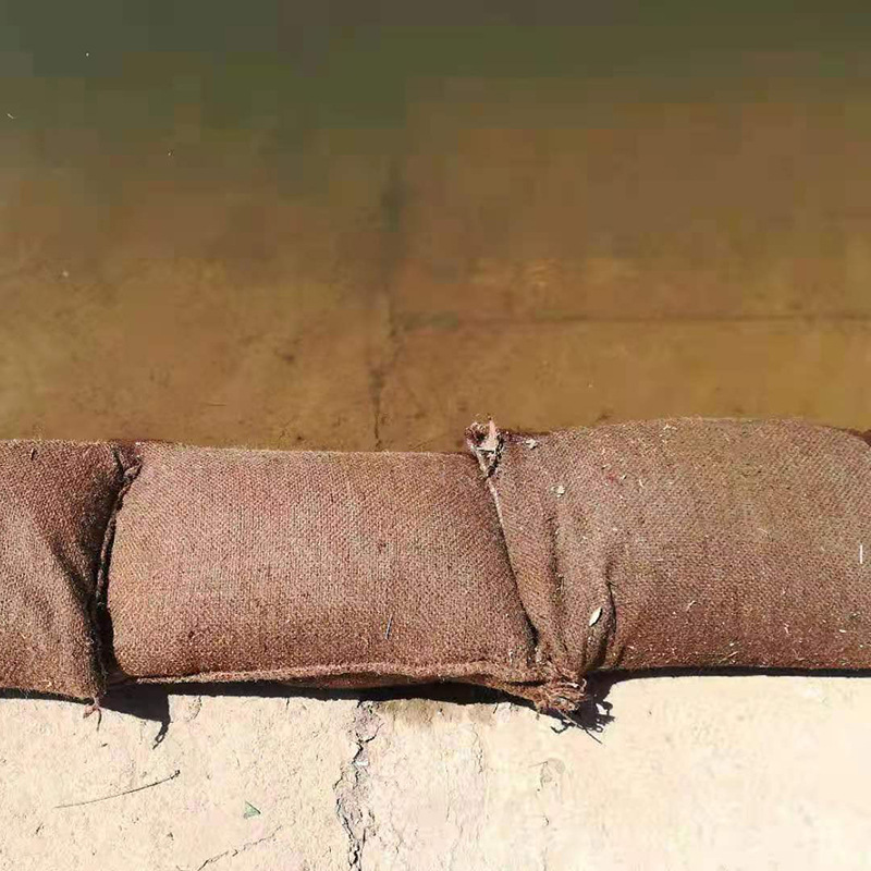 防汛膨胀带麻袋 生态护坡防汛麻袋 应急防洪堵漏吸水膨胀袋可定制