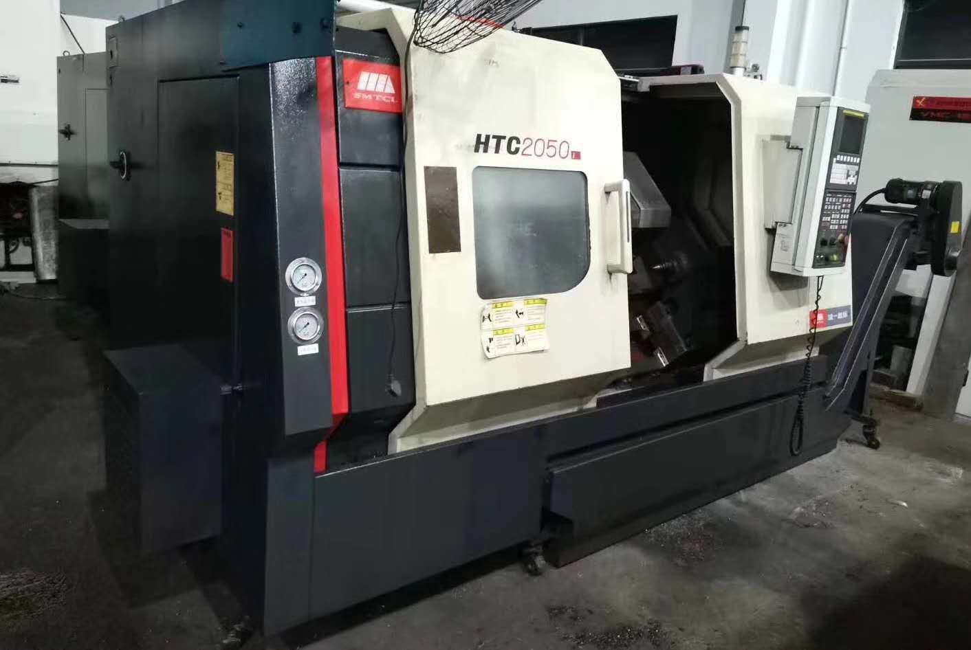 低价转让二手沈阳htc2050i数控斜身车床8工位刀塔
