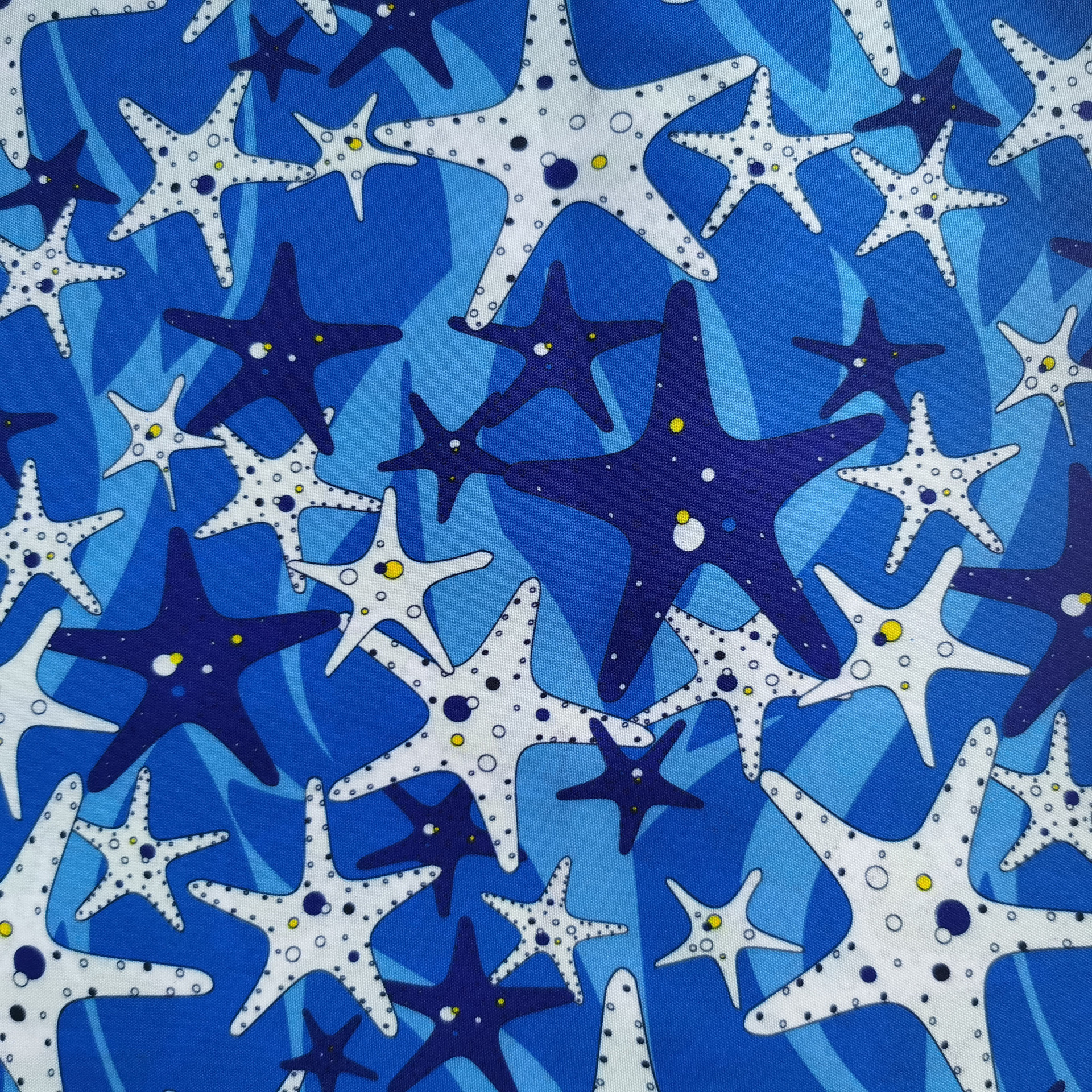 全涤涤纶桃皮绒 宽窄幅平斜纹 磨毛转移纸印花面料 蓝色海星图案