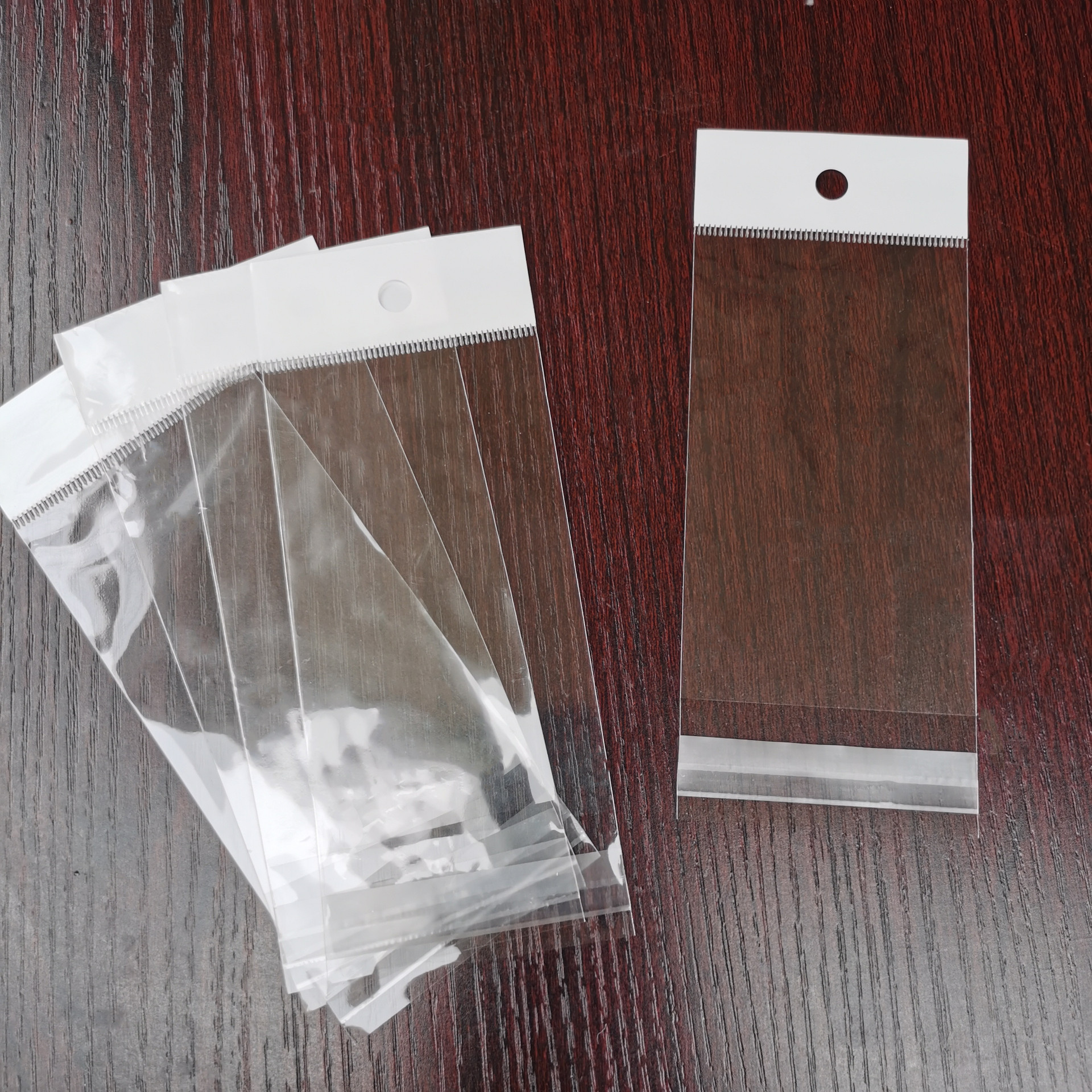 现货opp卡头袋透明挂孔袋 珠光膜飞机孔饰品包装袋定制可印刷logo