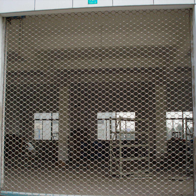 安装不锈钢通花网格卷帘门 电动渔网型卷帘门 商铺门店网状卷闸门