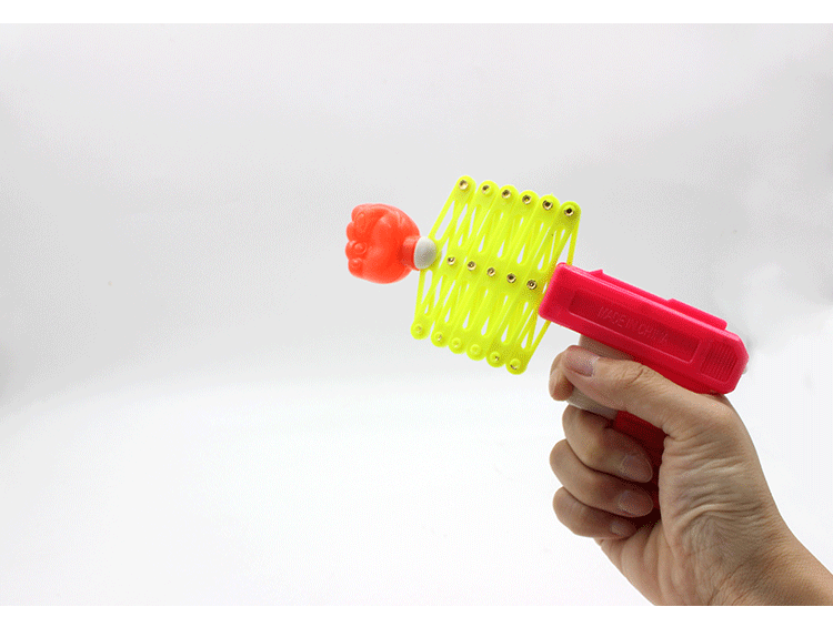 儿童玩具枪 创意伸缩拳头枪 迷你搞怪弹力枪 弹簧魔术枪小玩具