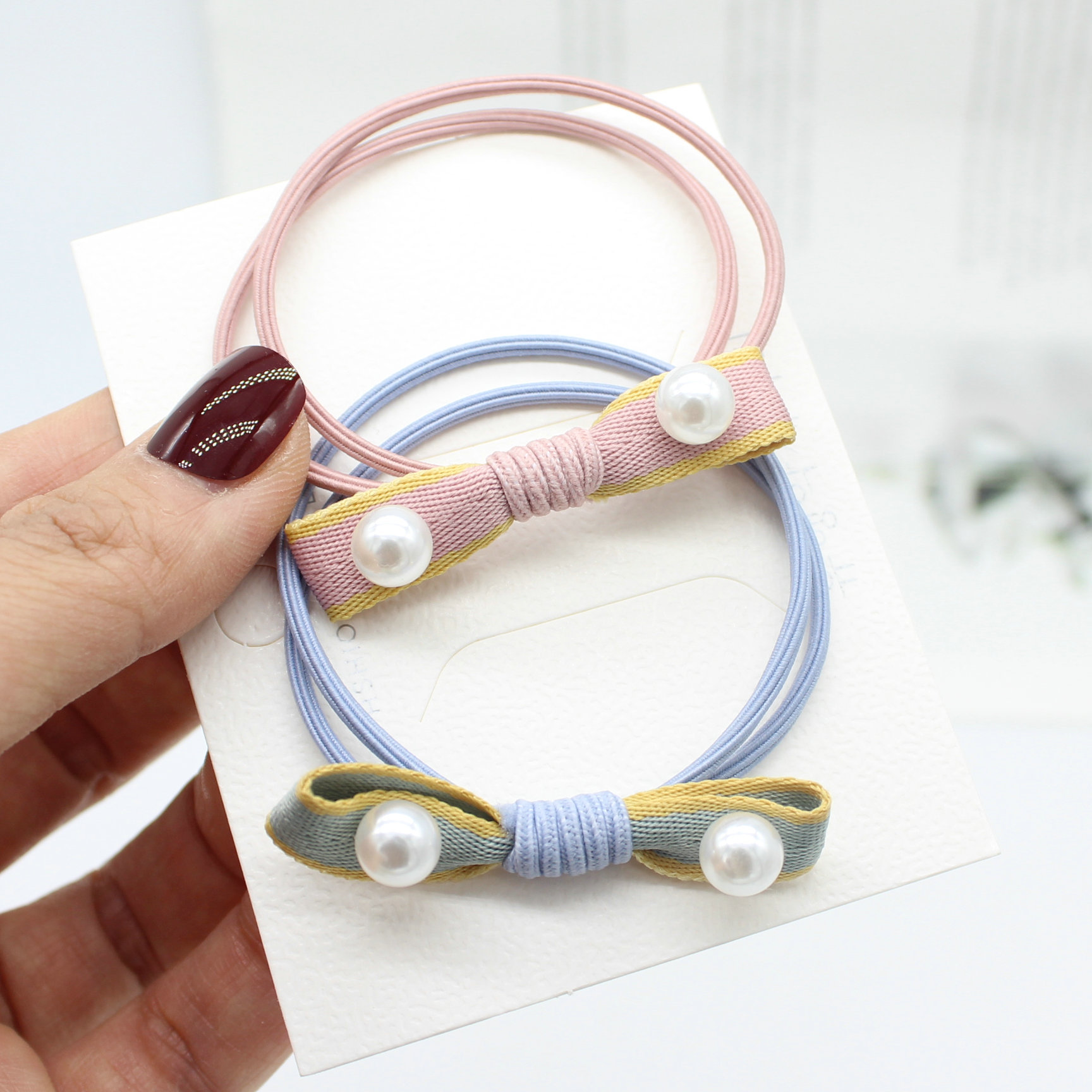 2元店饰品韩版发饰头饰简约蝴蝶结打钉珍珠皮筋可爱女扎头发圈