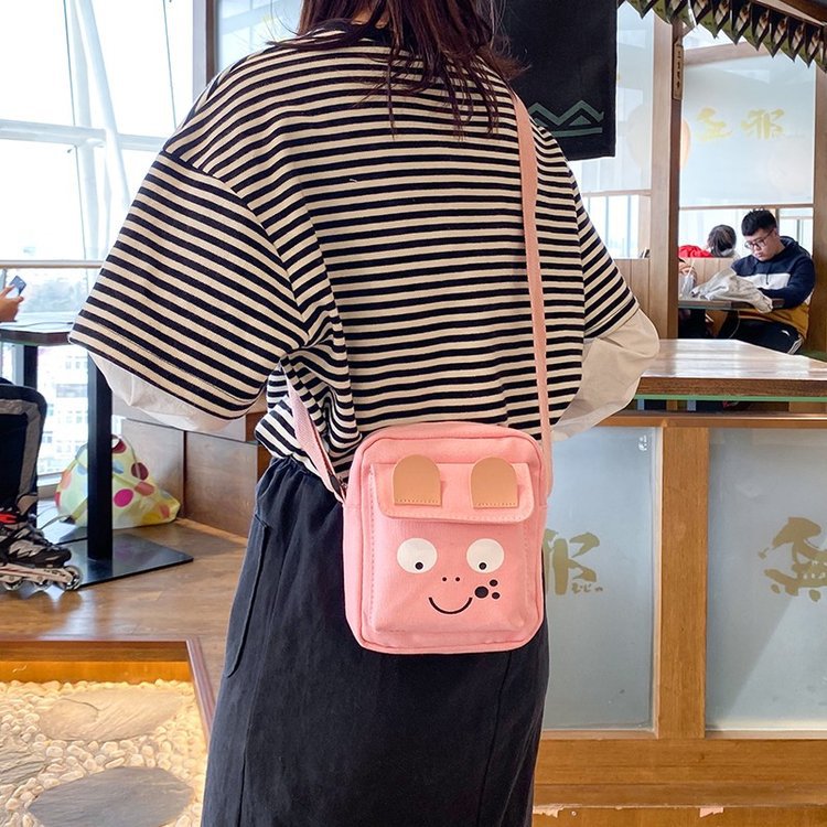 Japanese Ins Cute and Ugly Girl Canvas Shoulder Bag Funny Personality Cartoon Big Eyes Student Small Bags Women