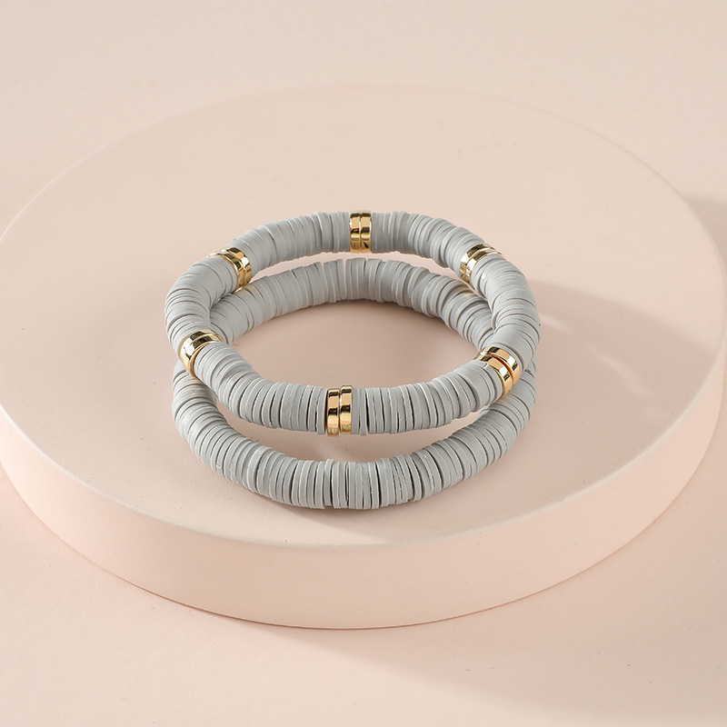 青岛黛薇欧美时尚饰品批发硅胶圆片女款弹力线手链套装2条