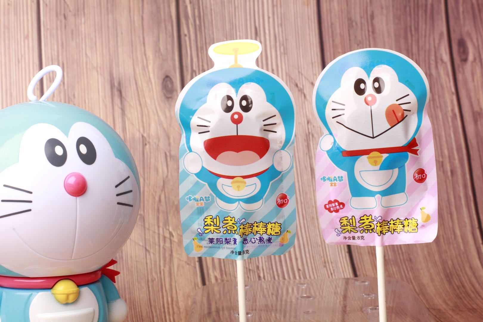 哆啦a梦梨煮棒棒糖莱阳梨膏 儿童秋梨膏糖桶装润喉零食糖8g*10支
