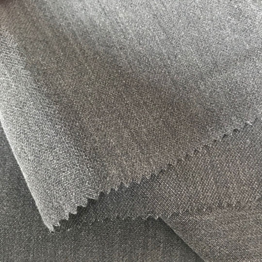 厂家直销 32s涤粘交织平纹tr四面弹面料 280g秋长裤风衣外套布料