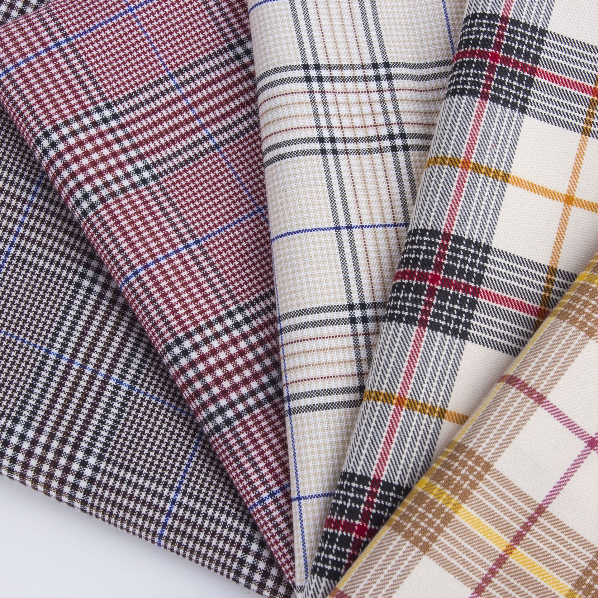 现货tr涤弹力西装格子面料 tr涤纶色织格子布 jk女装百褶裙面料