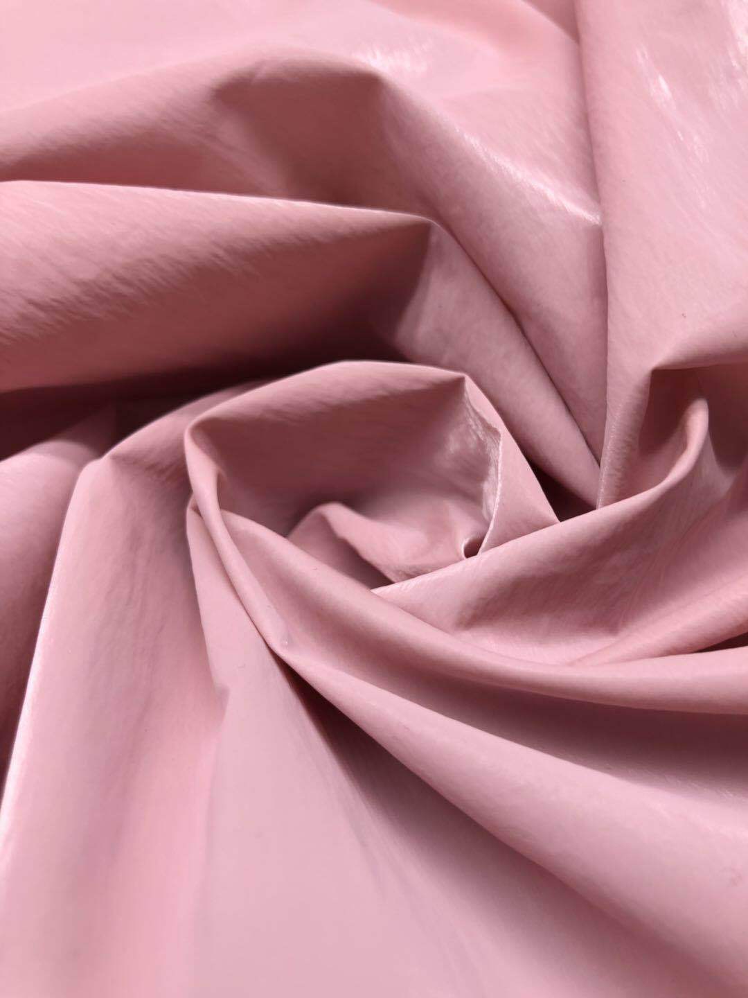 离型pu膜尼丝纺珠光膜 亮面烫金属布料 防晒防绒箱包 羽绒服面料