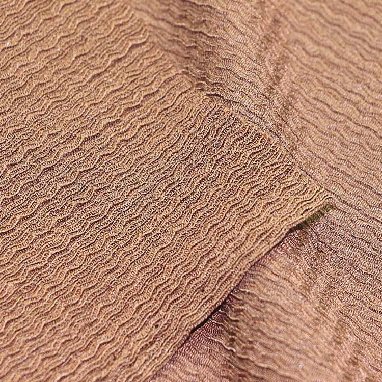 经编涤纶氨纶弹力针织提花凹凸泡泡纱绉布褶皱布时装女装童装面料