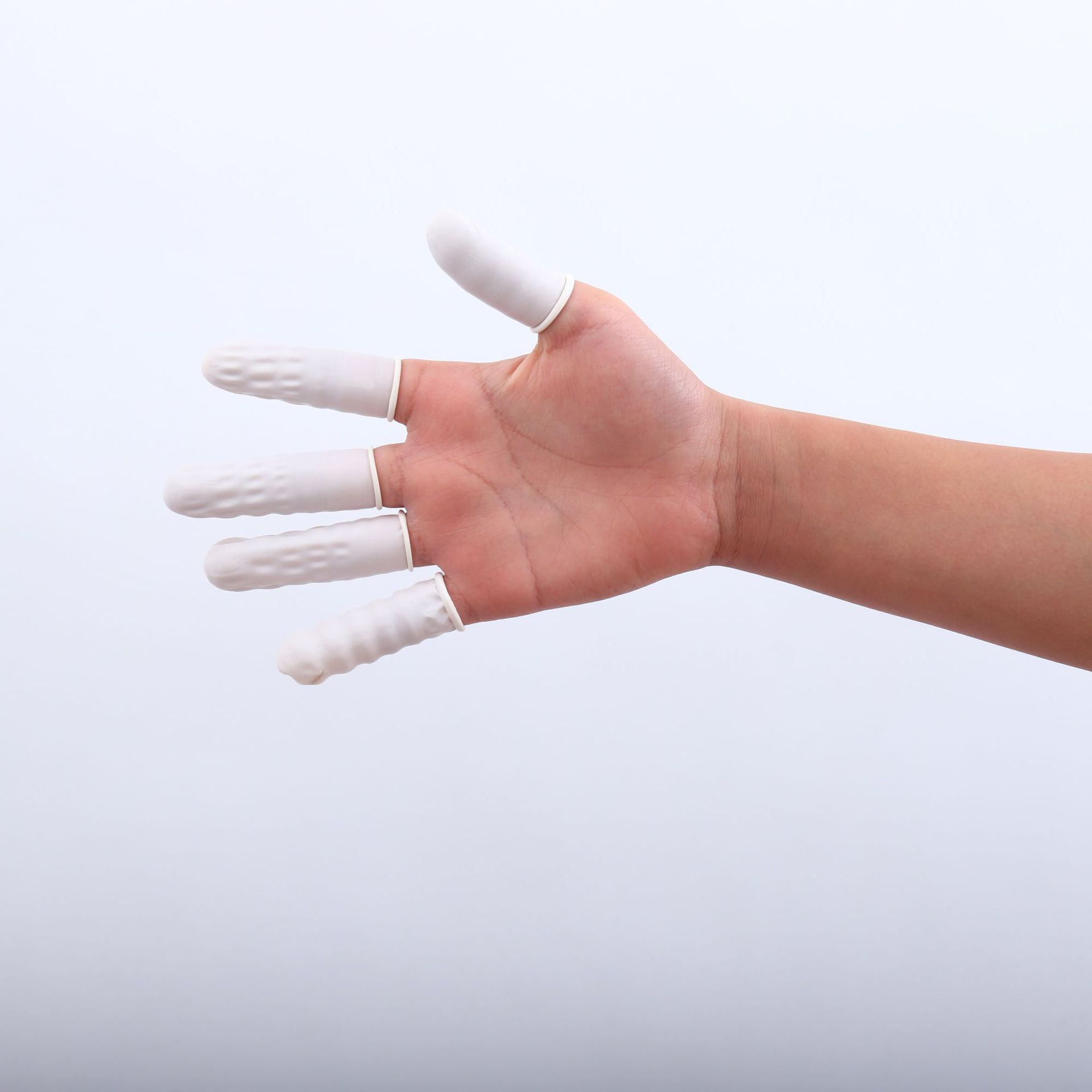 一次性乳胶手指套电子厂保护手指套 乳胶手指套乳白色卷边手指套