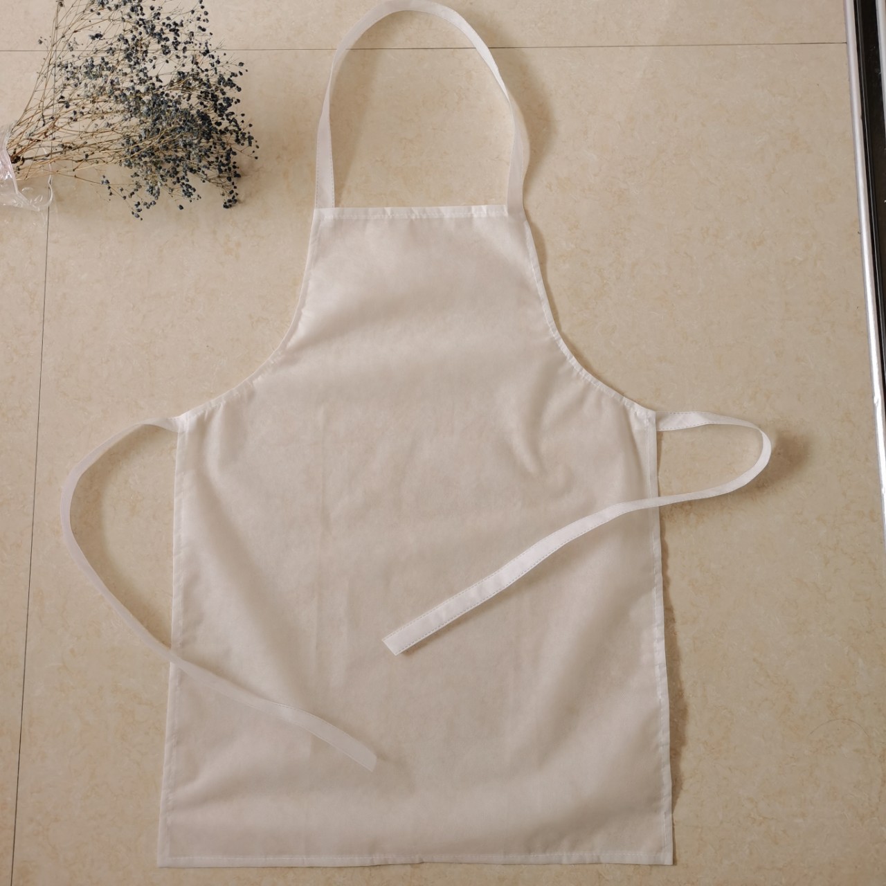 无纺布围裙新料一次性无纺布围腰火锅围裙可加印logo