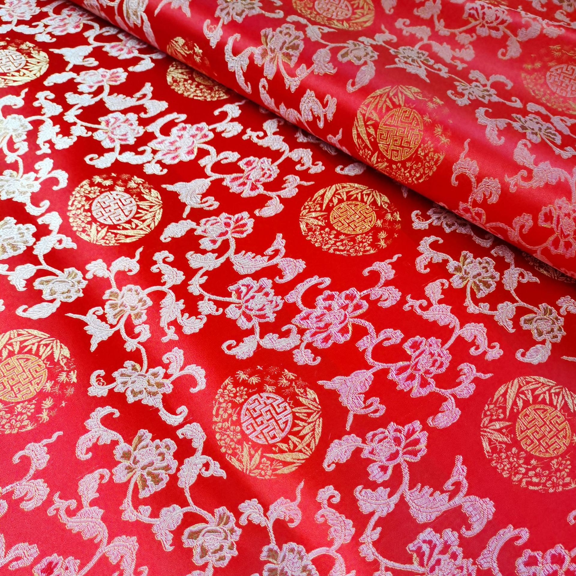 90尼龙织锦缎布料寿衣服装面料