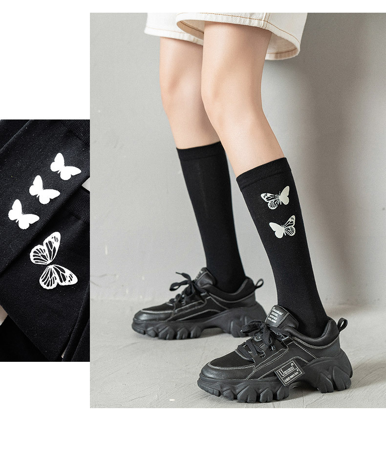 夜光袜子女中长筒发光蝴蝶袜子黑色袜子潮款日系网红堆堆袜小腿袜