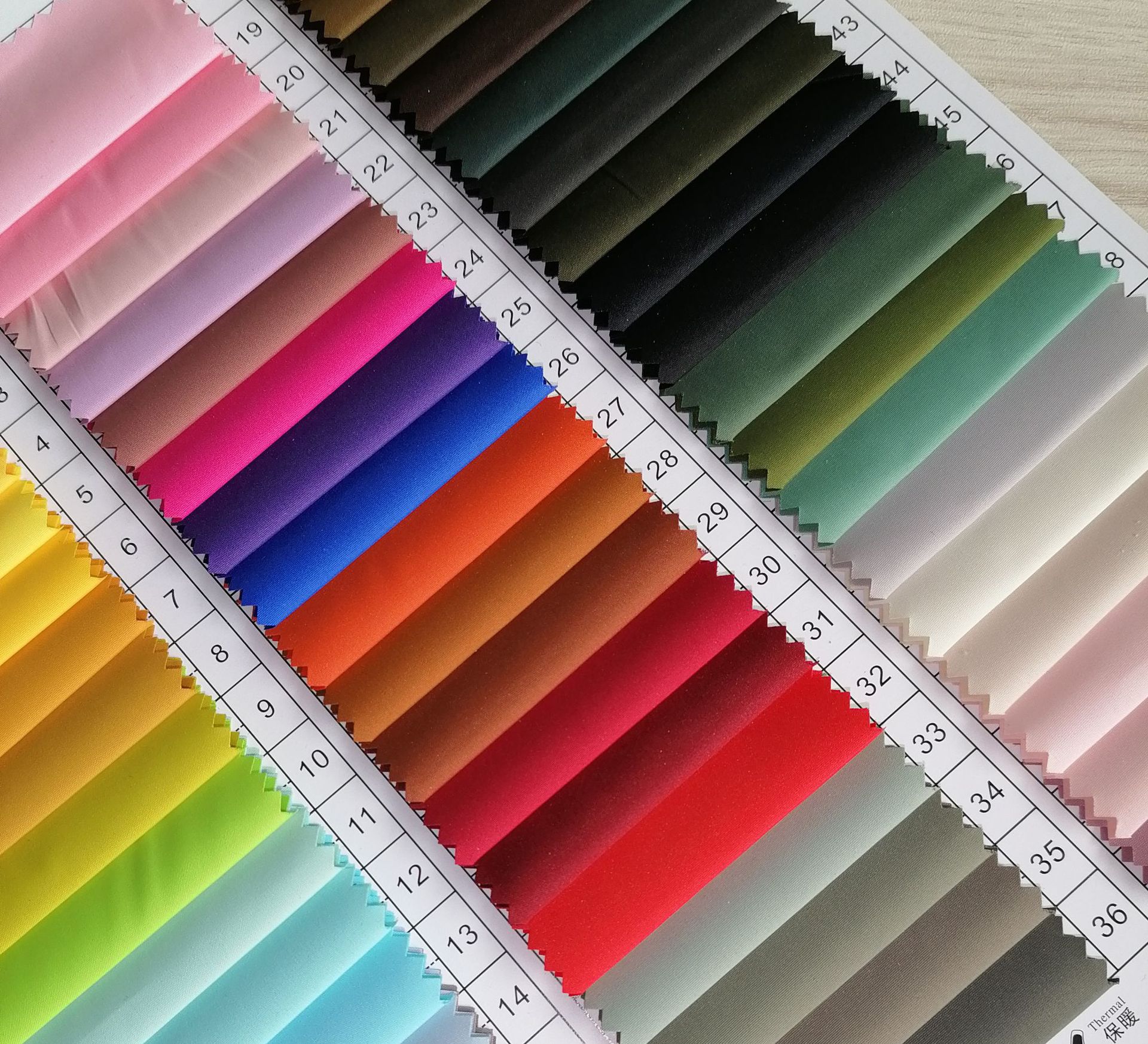 厂家批发涤纶50d消光过胶运动服里布布料色卡全现货