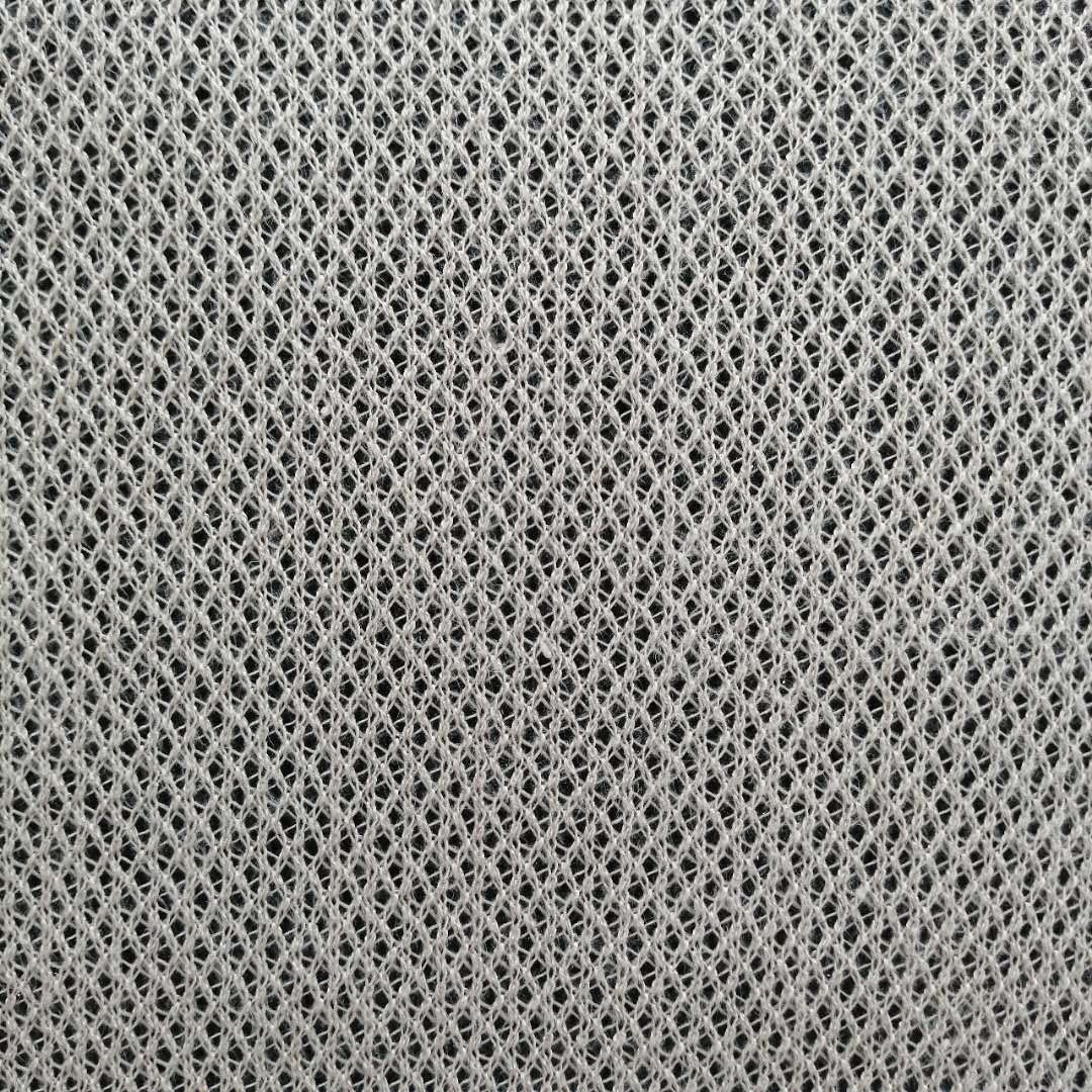 特价爆款网眼布针织面料涤棉提花网布粗针女装童装布料欢迎议价