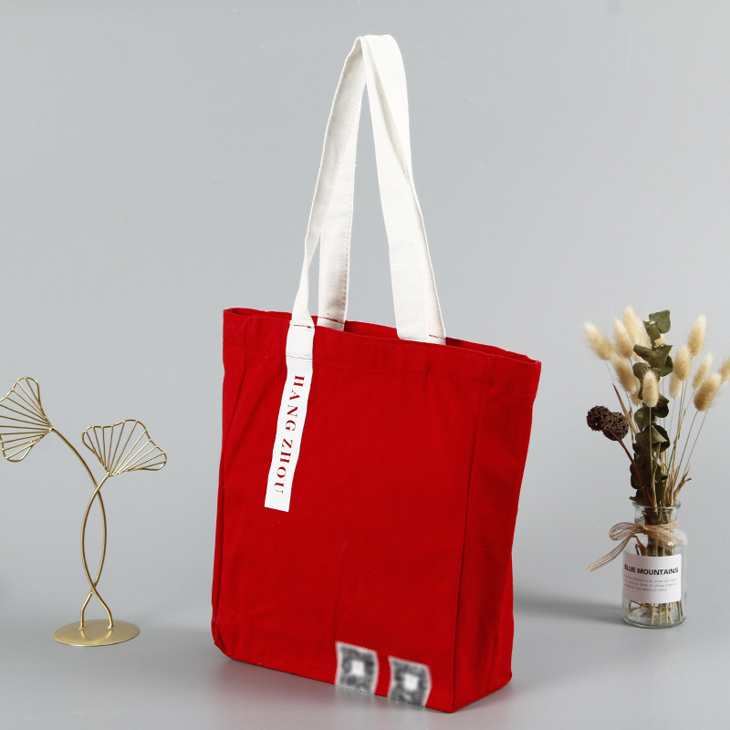 红色帆布袋定做棉布印花手提帆布袋空白广告学生帆布包定制印logo