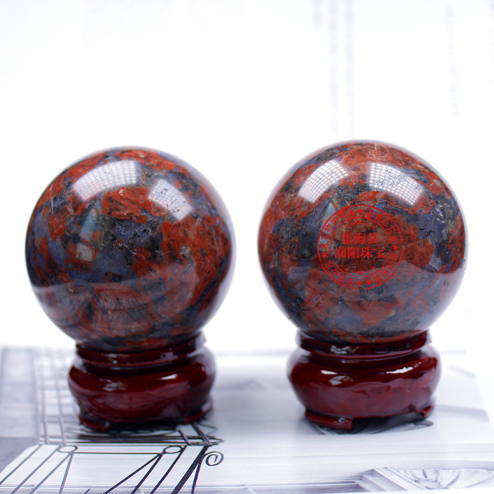 东海厂家批发天然水晶球原石打磨红闪石能量石家居桌面摆件送底座