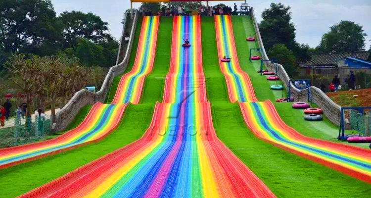 郑州悦童彩虹滑道气圈座圈游乐设备七彩旱滑彩虹滑梯滑道室外厂家