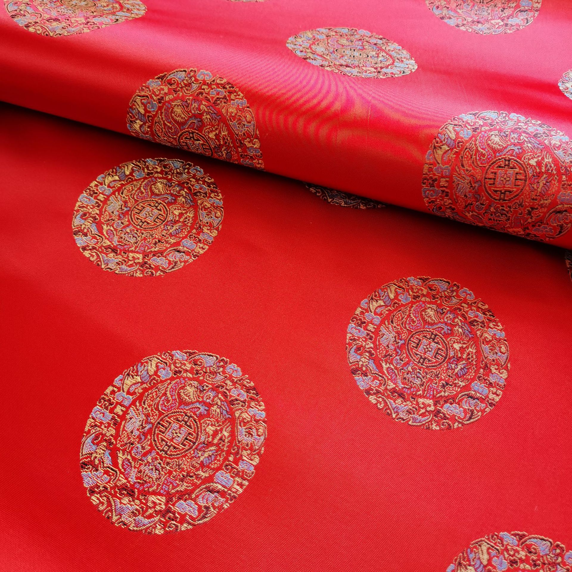 90尼龙织锦缎布料寿衣服装面料