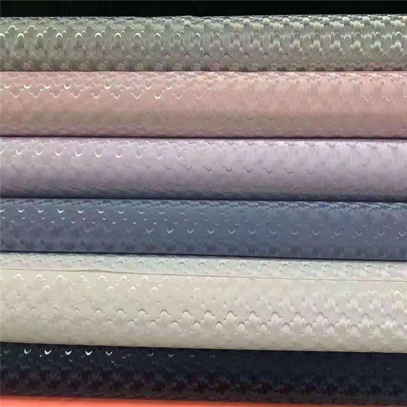 羽毛离型纸春亚纺面料 羽绒服棉服面料 羽毛花型离型纸羽绒布料