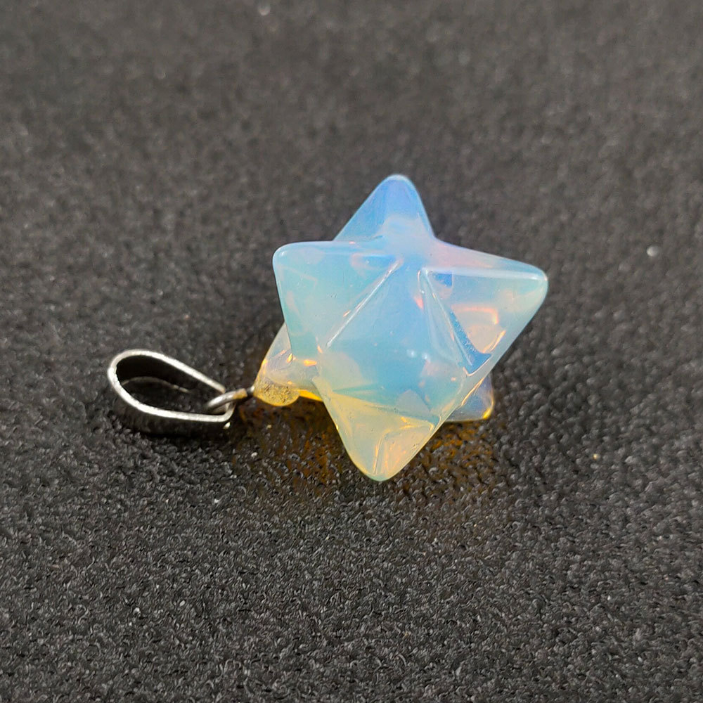 产品名称:六芒星吊坠 产品材质:天然水晶半宝石 产品尺寸:约14mm