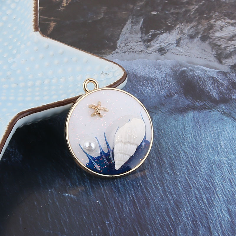 diy饰品配件夏日海滩贝壳海螺海星滴胶闪粉透明圆形吊坠材料挂件