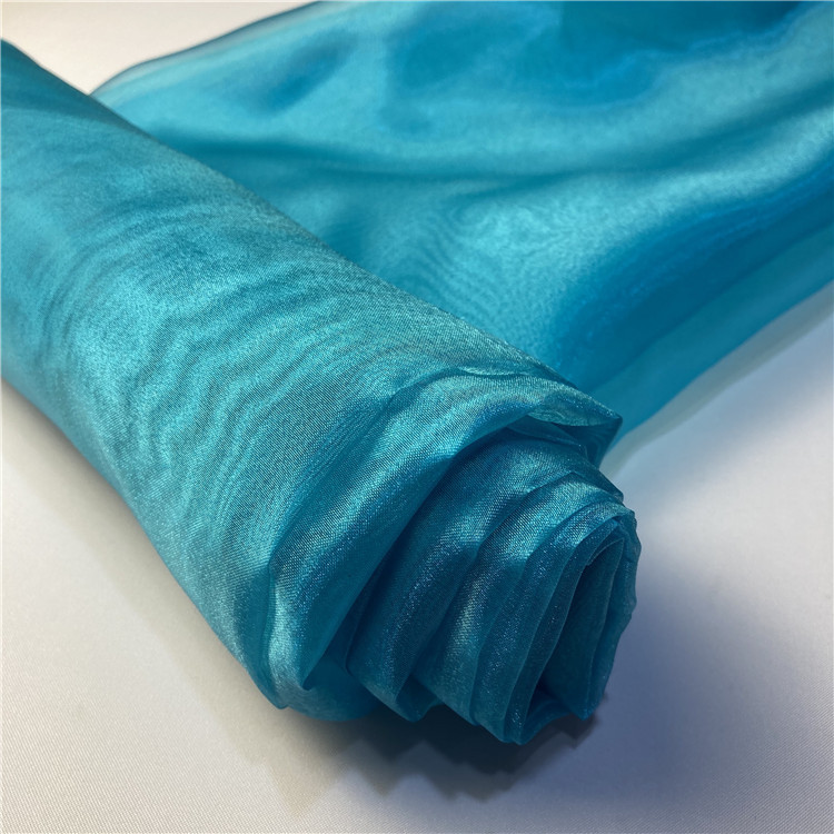 品名:欧根纱 幅宽:1米5 主要用途:演出服装,婚庆装饰等 产品特点:色彩