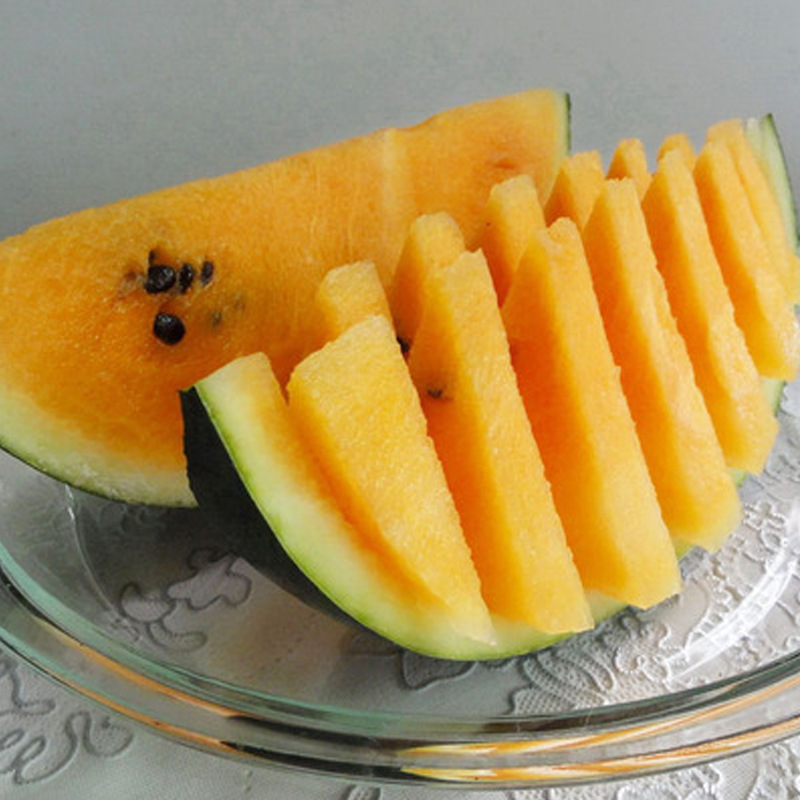 雪峰橙玉西瓜种籽高产四季懒汉橙黄色瓤南方春季庭院水果京欣种孑