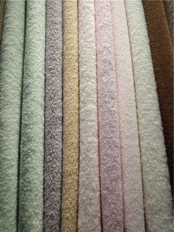 仿绵羊卷毛绒布玩具面料宝乐绒家居用品绒布针织面料