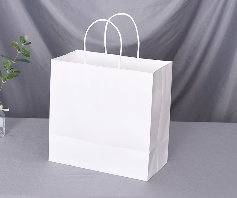 定制男女童装牛皮纸服装手提袋 牛皮纸现货购物衣服服装店手提袋