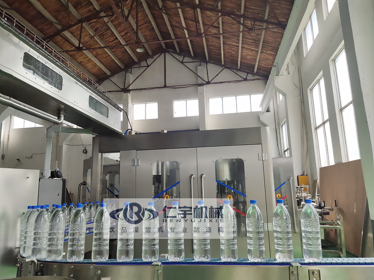 小瓶矿泉水设备生产线瓶装矿泉水三合一灌装机