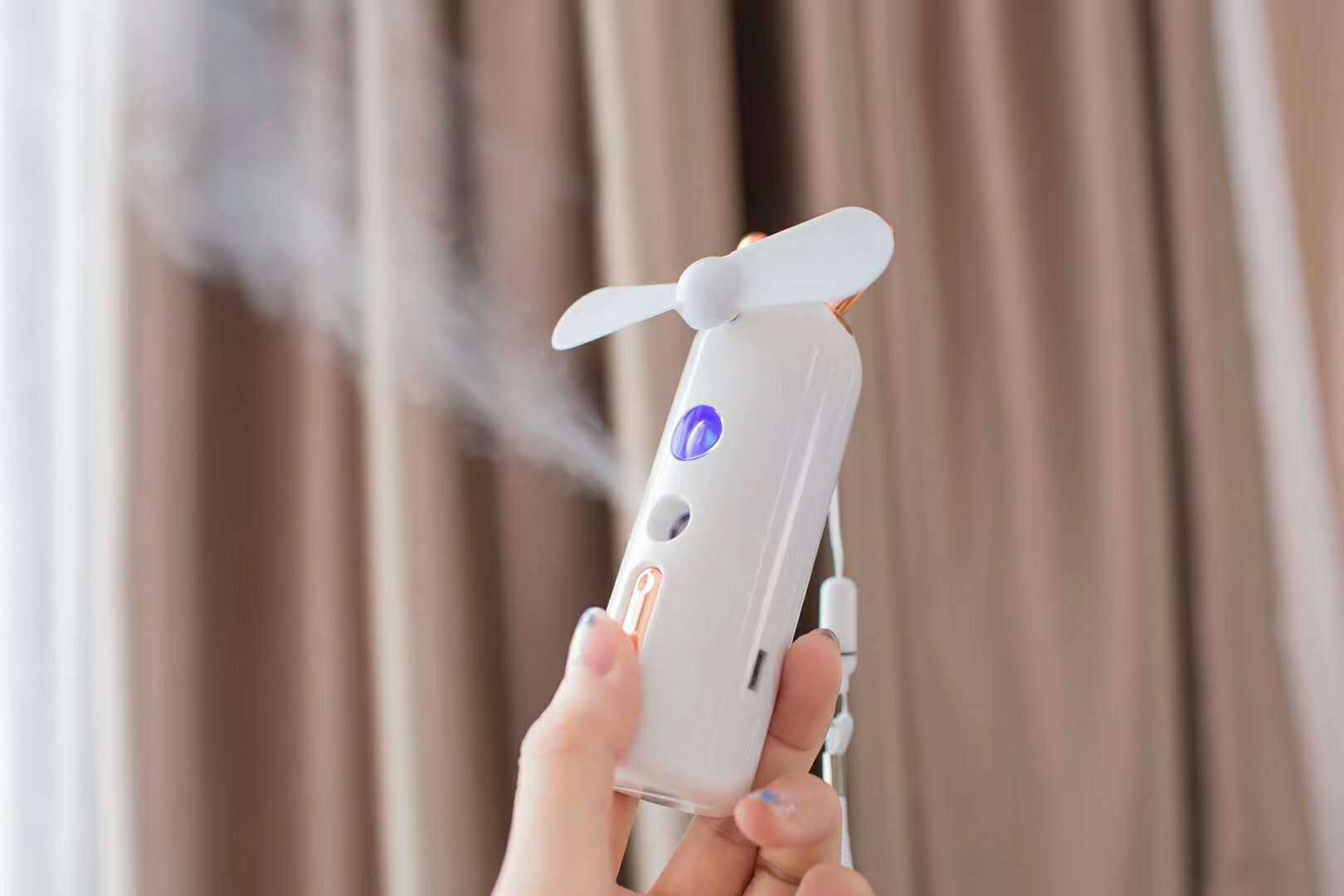 地摆抖音同款纳米学生办公卡通补水仪充电风扇迷你手持兔子小鹿